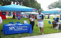 SPC College booth at an outdoor event.